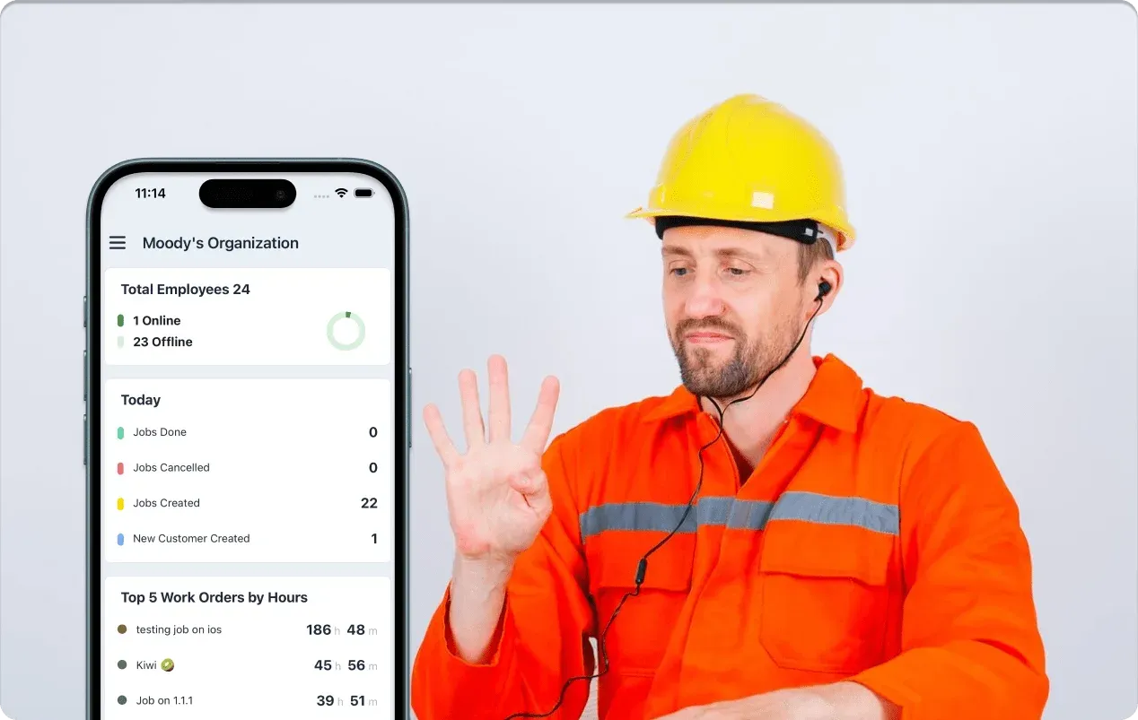 A technician sitting beside a mobile time tracking app's dashboard