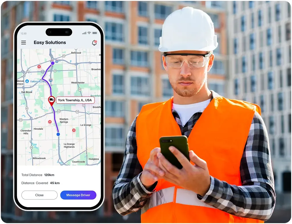 Construction worker using mobile app for live GPS location tracking