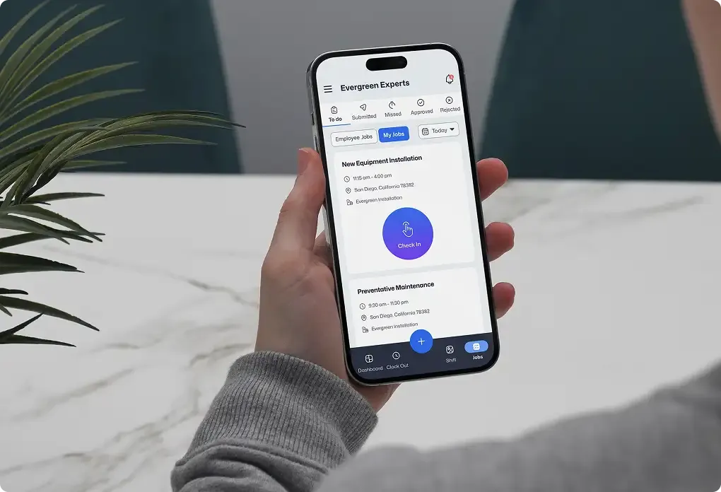 Hand holding smartphone with field service jobs app